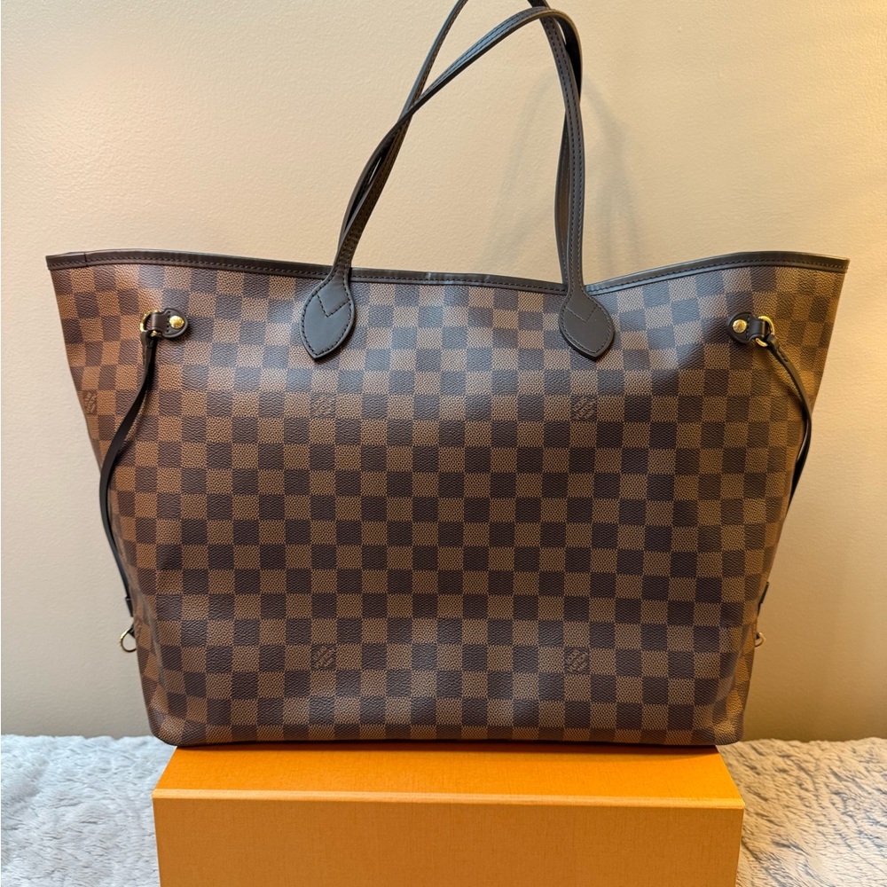 Louis Vuitton GM Damier Ebene Tote with bag and pouch inserts.